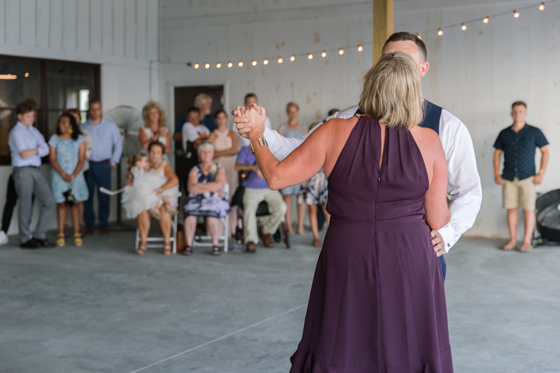 This navy and blush summer wedding at The Goldfish Barn was full of endless laughter and love. It was a family centered wedding with unique wedding details. For more from Gettysburg, PA wedding photographer visit Jamie Fisher Collective | www.jamiefishercollective.com