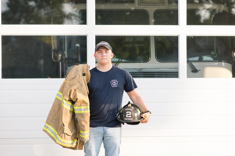 This Fairfield firefighter senior session was perfect for Tyler. After time at the station, we headed to the farm for a rustic outdoor senior session. For more Fairfield senior photo ideas visit www.jamiefishercollective.com | Jamie Fisher Collective