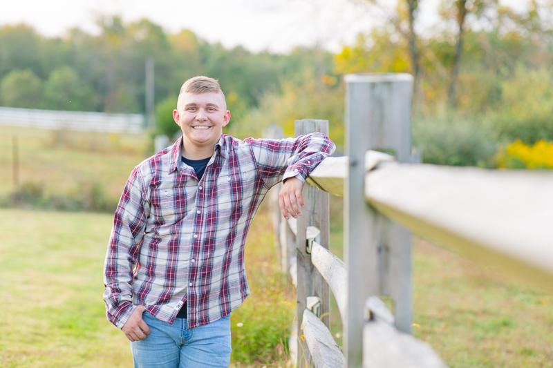 This Fairfield firefighter senior session was perfect for Tyler. After time at the station, we headed to the farm for a rustic outdoor senior session. For more Fairfield senior photo ideas visit www.jamiefishercollective.com | Jamie Fisher Collective