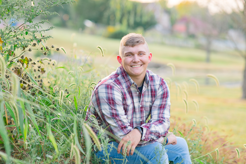 This Fairfield firefighter senior session was perfect for Tyler. After time at the station, we headed to the farm for a rustic outdoor senior session. For more Fairfield senior photo ideas visit www.jamiefishercollective.com | Jamie Fisher Collective