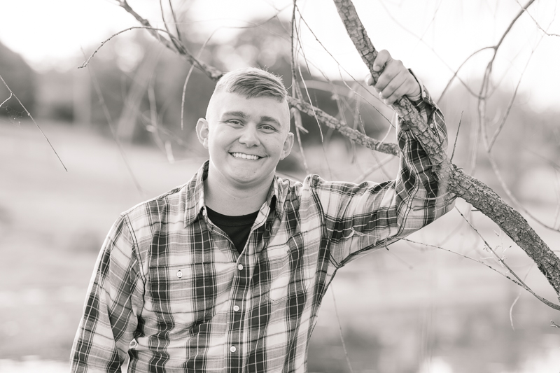 This Fairfield firefighter senior session was perfect for Tyler. After time at the station, we headed to the farm for a rustic outdoor senior session. For more Fairfield senior photo ideas visit www.jamiefishercollective.com | Jamie Fisher Collective