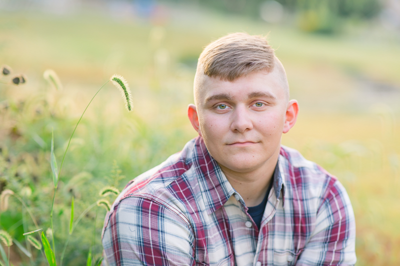 This Fairfield firefighter senior session was perfect for Tyler. After time at the station, we headed to the farm for a rustic outdoor senior session. For more Fairfield senior photo ideas visit www.jamiefishercollective.com | Jamie Fisher Collective