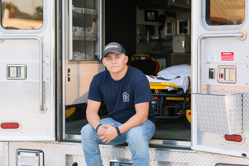 This Fairfield firefighter senior session was perfect for Tyler. After time at the station, we headed to the farm for a rustic outdoor senior session. For more Fairfield senior photo ideas visit www.jamiefishercollective.com | Jamie Fisher Collective