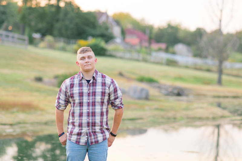 This Fairfield firefighter senior session was perfect for Tyler. After time at the station, we headed to the farm for a rustic outdoor senior session. For more Fairfield senior photo ideas visit www.jamiefishercollective.com | Jamie Fisher Collective