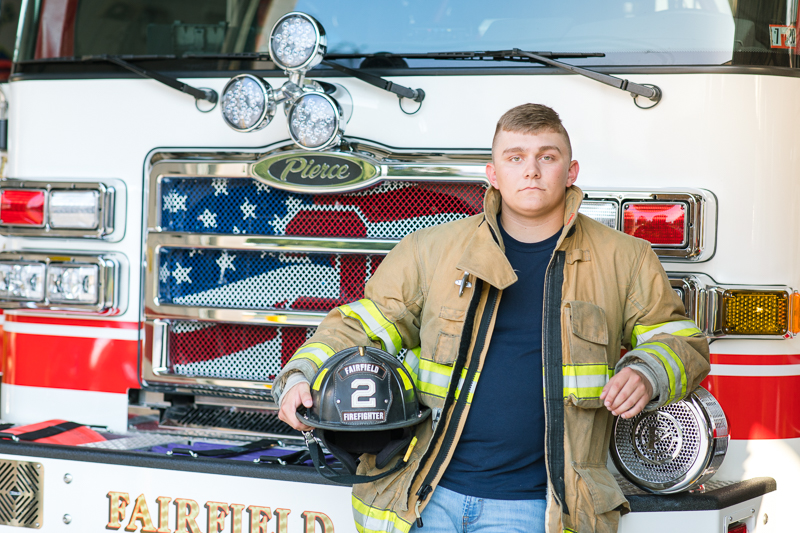 This Fairfield firefighter senior session was perfect for Tyler. After time at the station, we headed to the farm for a rustic outdoor senior session. For more Fairfield senior photo ideas visit www.jamiefishercollective.com | Jamie Fisher Collective